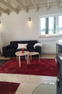 worpswede ferienhaus waldhaus wohnbereich wohnzimmer couch
